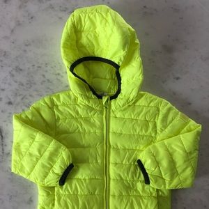 Bright yellow puff jacket.